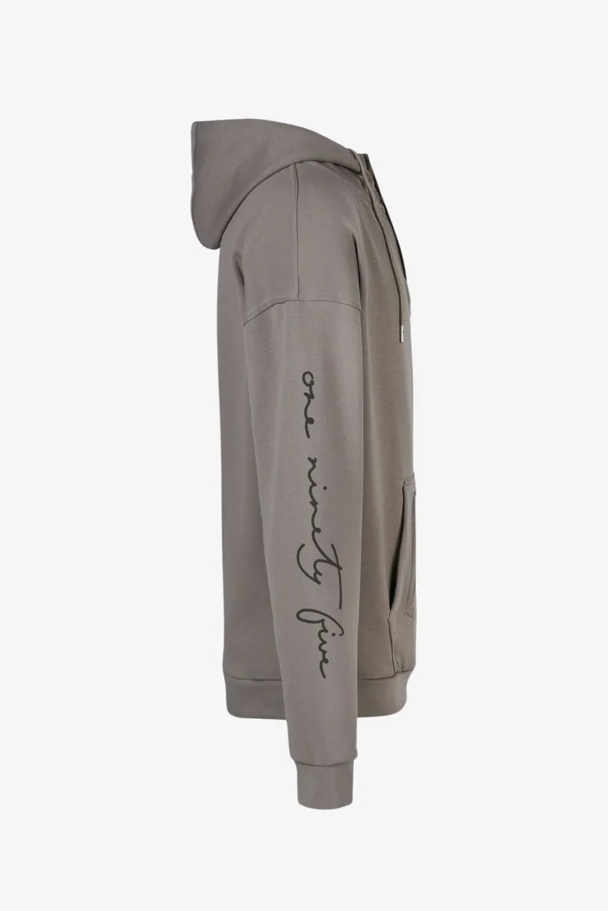 Extra-langer Henley Hoodie in creme mit extra langen Ärmeln und mit Signature Print auf dem Arm